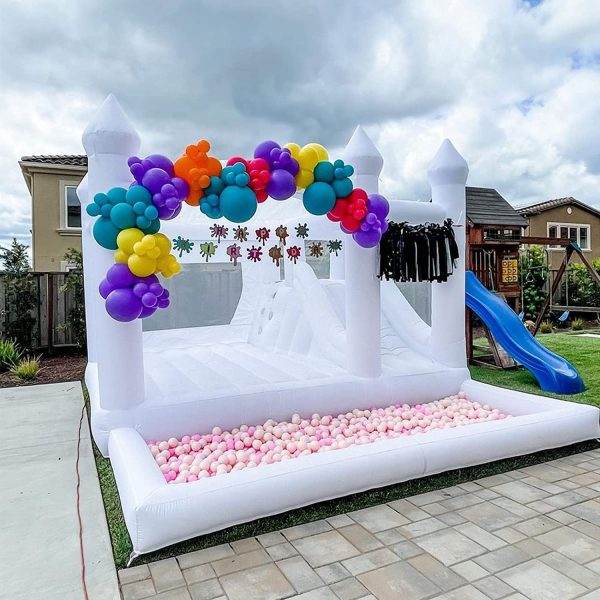A 15FT X 13FT White Bounce House with balloons in the backyard transformed into a Teepee Lakeland party paradise.
